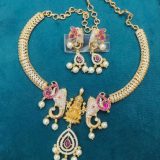 gold temple bridal necklace set with earrings and pearls