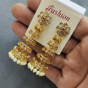 Gold jhumka earrings with pearl drops