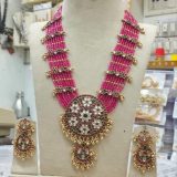 pink stone temple bridal necklace set with earrings