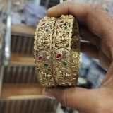 gold temple design bridal bangles with stones